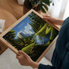 a woman holding up a picture of a forest